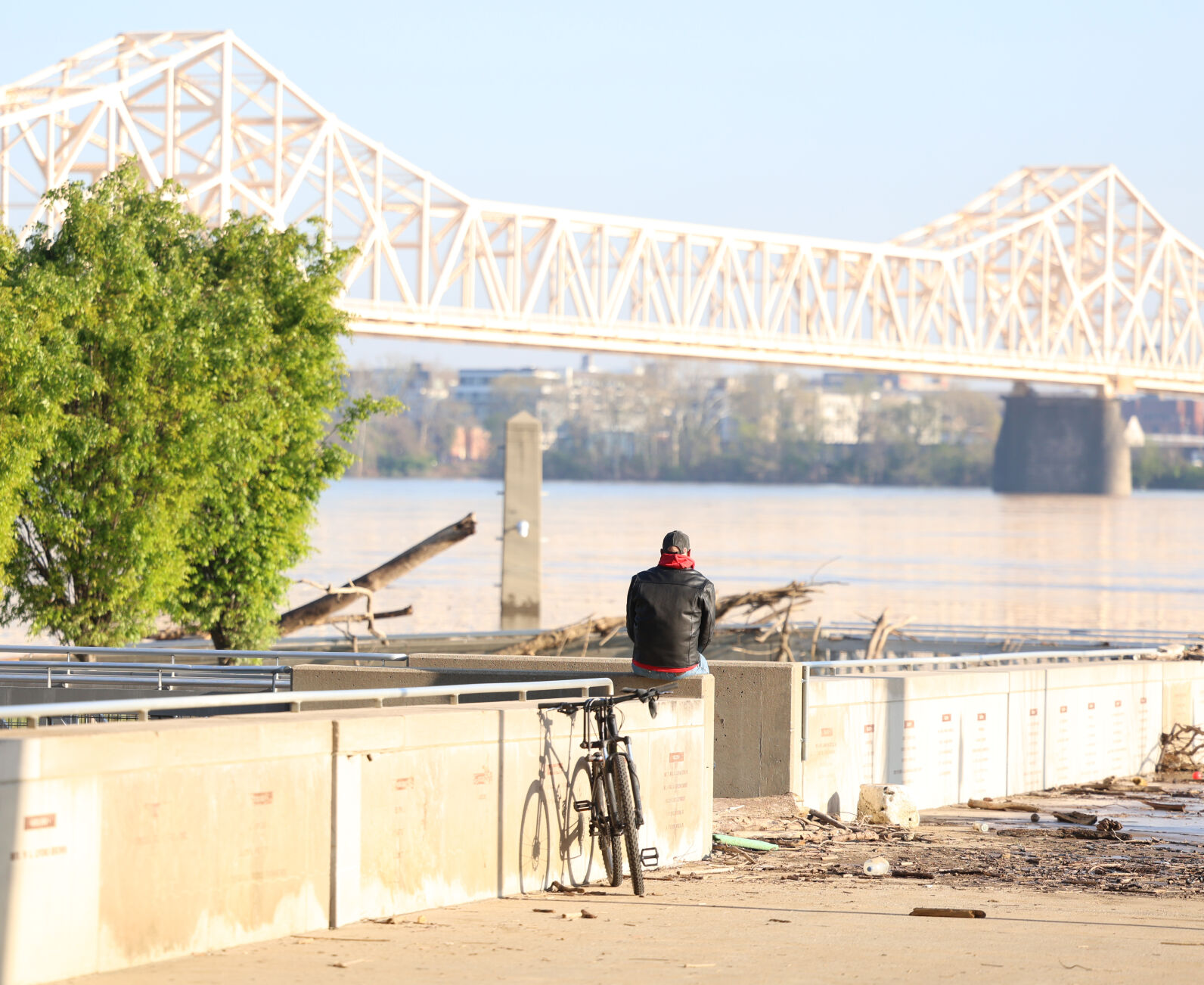 Man sits at Waterfront Park